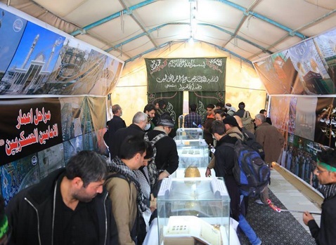 تنظيم معرض صور لمراحل إعمار مرقد الإمامين العسكريين (ع) على طريق الزائرين