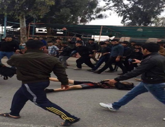 في كركوك :الاهالي يقومون بسحل احد الدواعش من امام قصر كركوك (مصور)