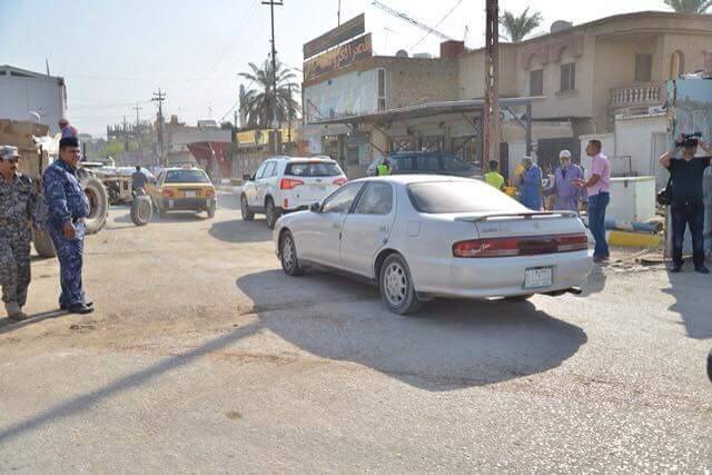 بالصور:كربلاء تعيد فتح بعض الطرق المغلقة امام سير المركبات باستثناء شارع المحكمة