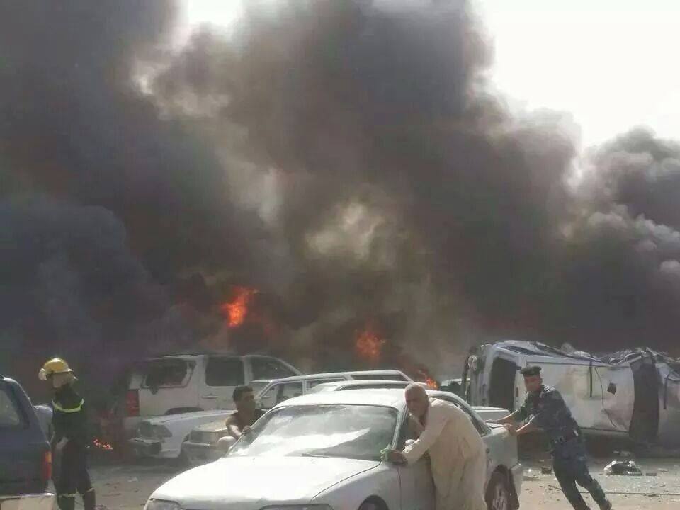 بالصور:انفجار سيارة ملغومة مركونة في كراج لوقوف المركبات وسط سوق العشار بالبصرة