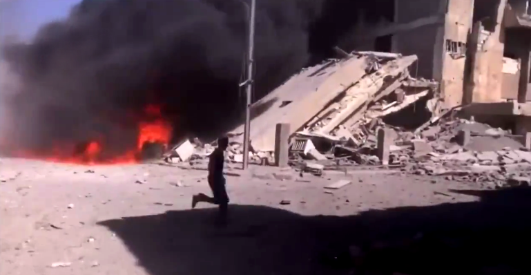 بالفيديو: عشرات القتلى والجرحى بإولى الغارات الروسية على مواقع تنظيم داعش في سوريا