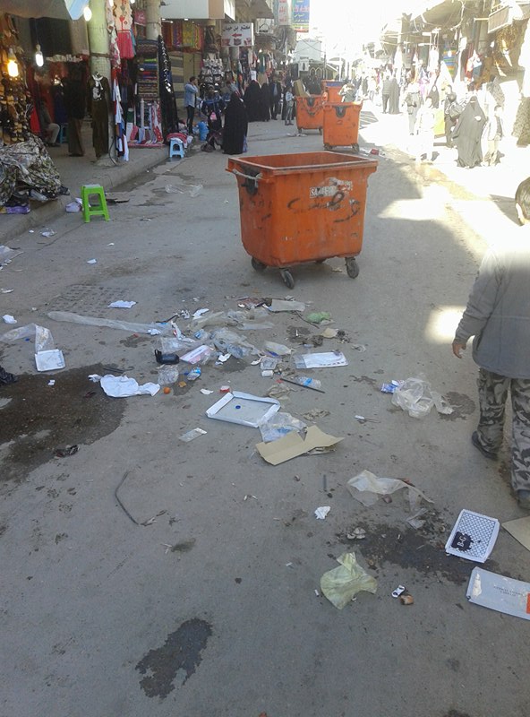 بالصور:النفايات وسط شارع الامام علي بمركز كربلاء