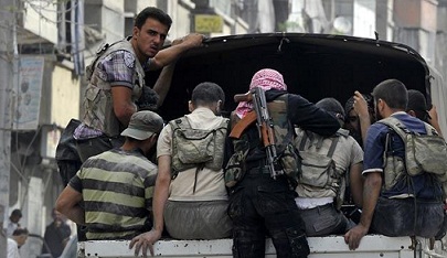 مسلح صيني يحارب مع المسلحين ضد النظام السوري