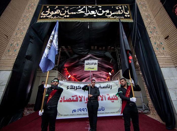 جامعة كربلاء بكلياتها تشارك بمراسيم عاشوراء وتعلن استعدادها لمقاتلة الدواعش(مصور)