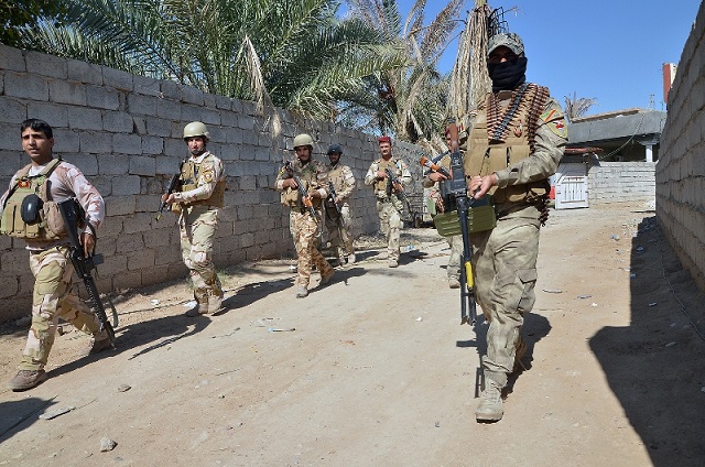 الجيش والحشد يتقدم في بيجي وداعش تنصب مفارز اعدامات لعناصرها الفارين بين طريق بيجي الموصل