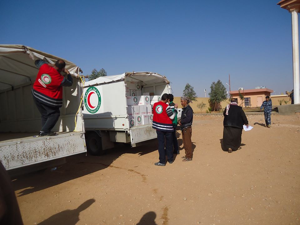 الهلال الاحمر العراقي في كربلاء يوزع 700سلة غذائية على العوائل النازحة من الانبار