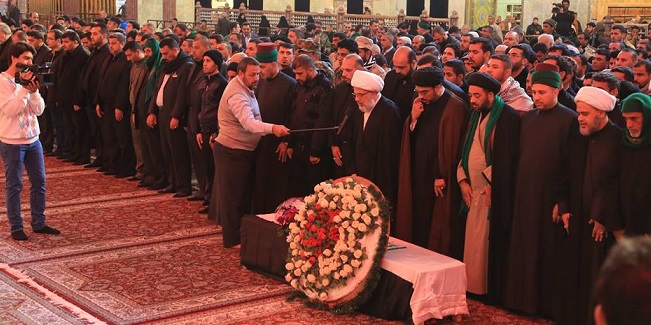 بالصور :ممثل المرجع السيستاني يصلي على جثمان قيادي بالحشد الوطني سقط شهيدا في قاطع بلد