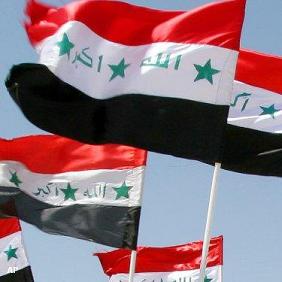 رفع العلم العراقي في محافظة اربيل بشمال العراق خلال مؤتمر البرلمانات العربية