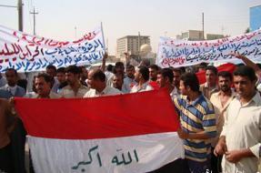 تظاهرة للحراس الليليين في كربلاء للمطالبة بتسلم رواتبهم