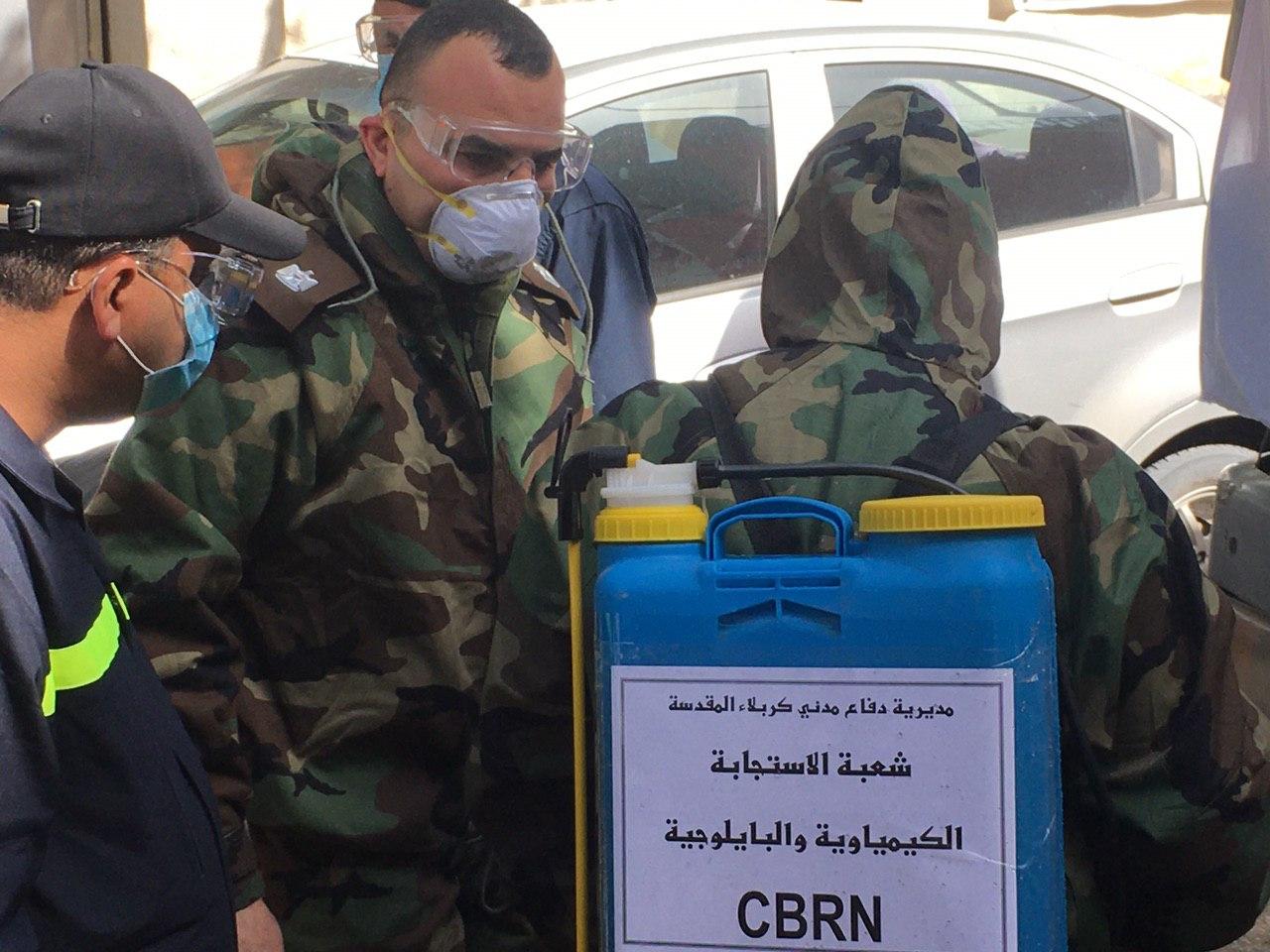 كربلاء.. الدفاع المدني يشرع بتطهير وتعقيم الاماكن العامة لمواجهة فيروس كورونا (فيديو)