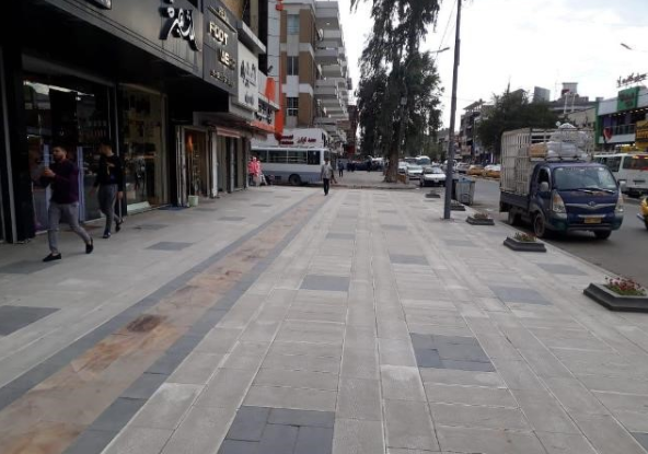 القبض على متهمين بحوزتهما كارتات تلقيح مزيفة في الكرادة وسط بغداد