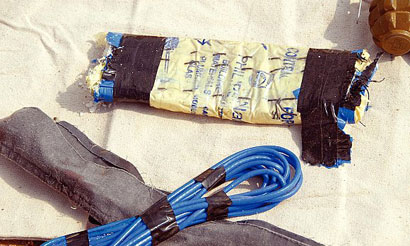 الاجهزة الامنية تلقي القبض على امرأه ترتدي حزاما ناسفا