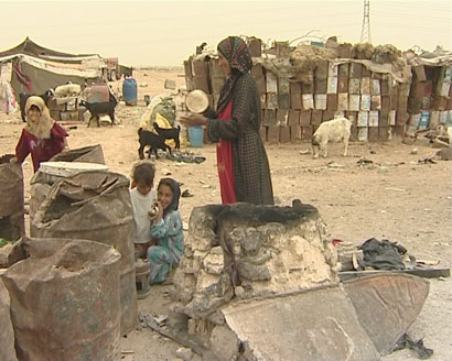 عوائل تسكن بيوتا من تنك في كربلاء (تقرير مصور)