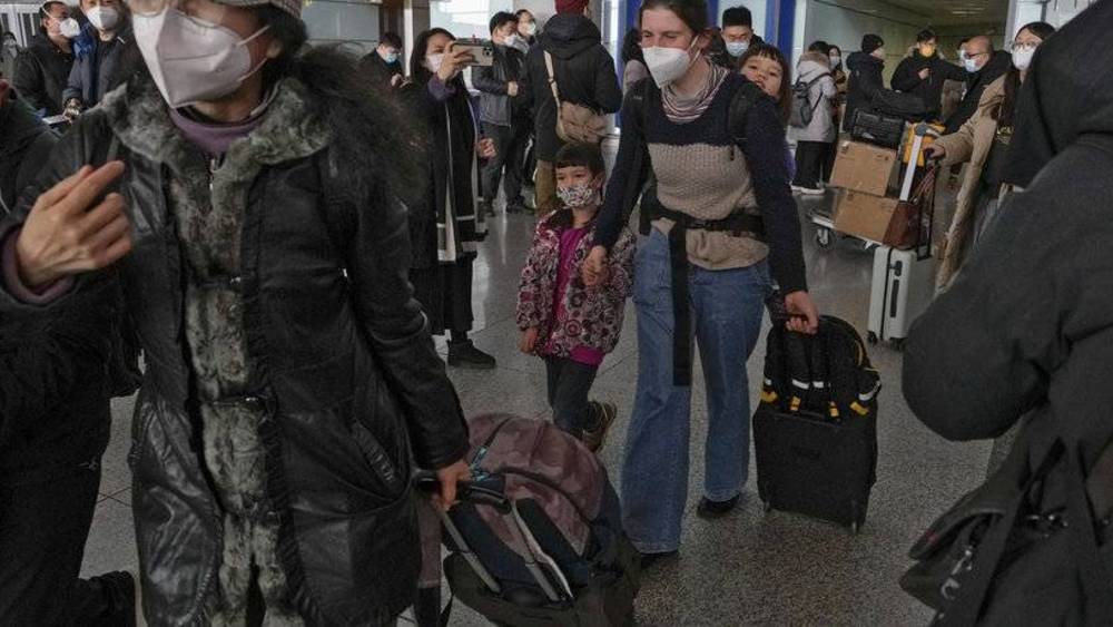 الصين: «كوفيد» يبلغ ذروته وسط موسم العطلات والسفر