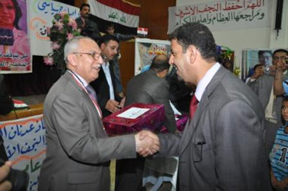 وسام الإعلام العراقي لرئيس جامعة الكوفة