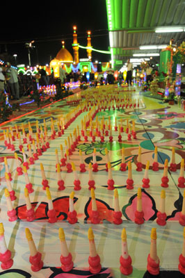 ايقاد 1176 شمعة  بعمر الامام الغائب (عجل الله فرجه الشريف) في وسط كربلاء