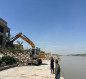 بلدية الدورة تشرع بحملة كبيرة لإزالة التجاوزات عن نهر دجلة