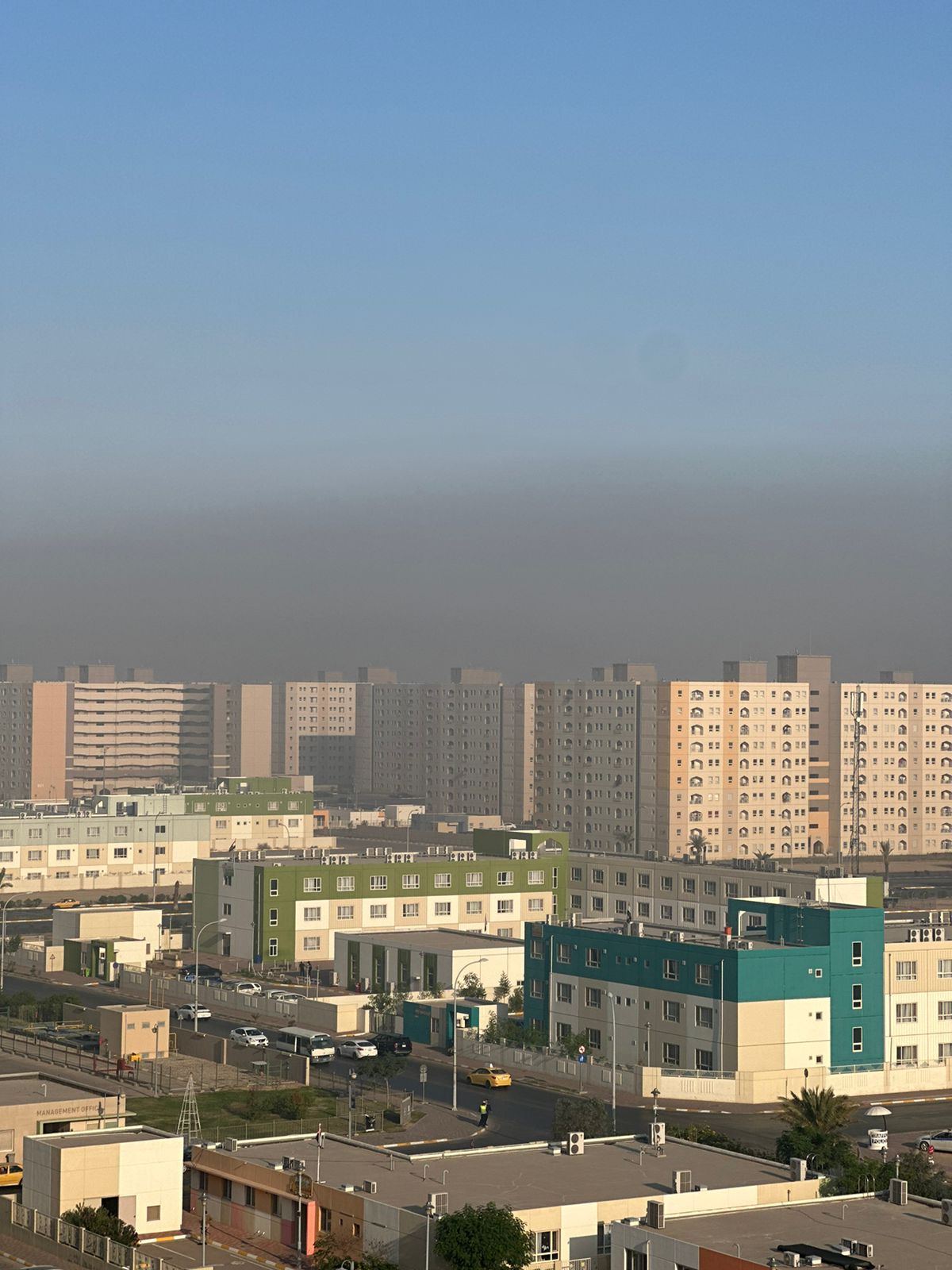 تحذير من كارثة انسانية.. هواء مجمع "بسماية" الاعلى تلوثا بين مناطق العراق