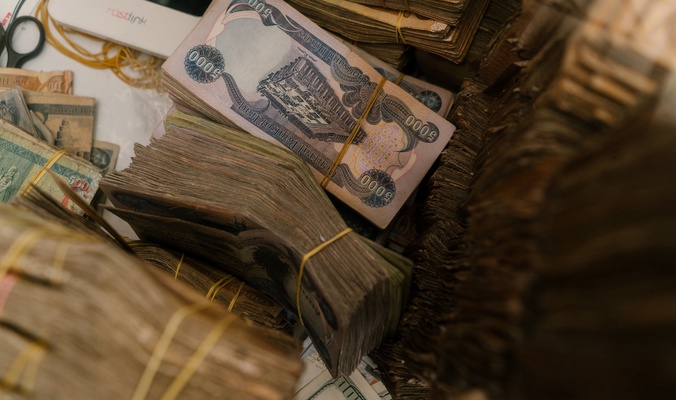 عن تقرير البنك المركزي العراقي المُكرّس للحفاظ على قيمة الدينار مقابل الدولار