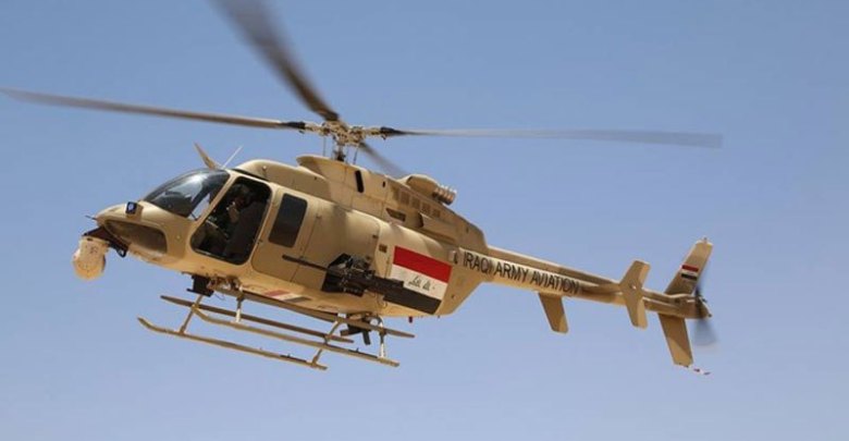 بالصورة .. طيران الجيش يلقي منشورات فوق كربلاء