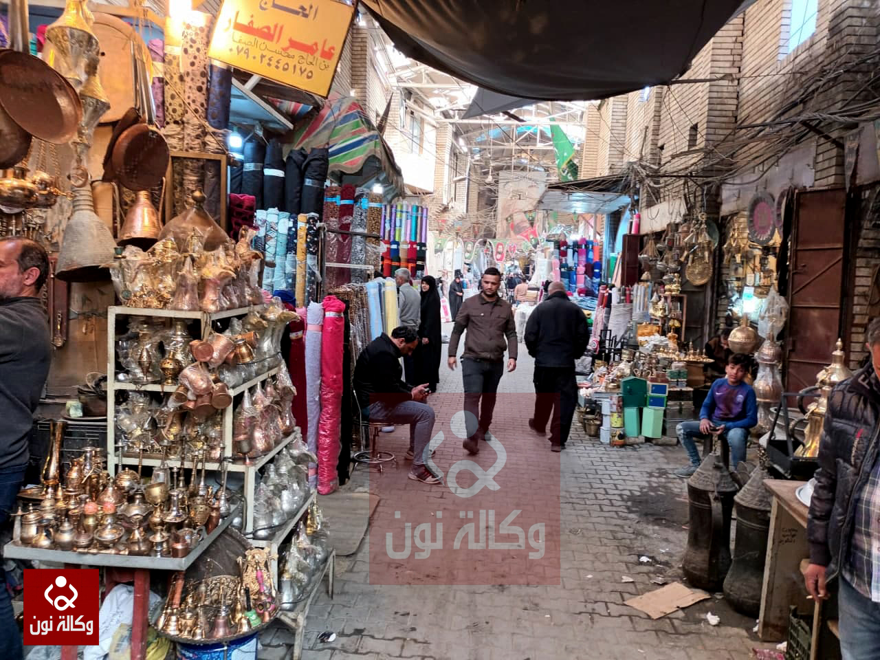 في سوق الصفافير.. الاقمشة تبتلع النحاس  (تقرير مصور)