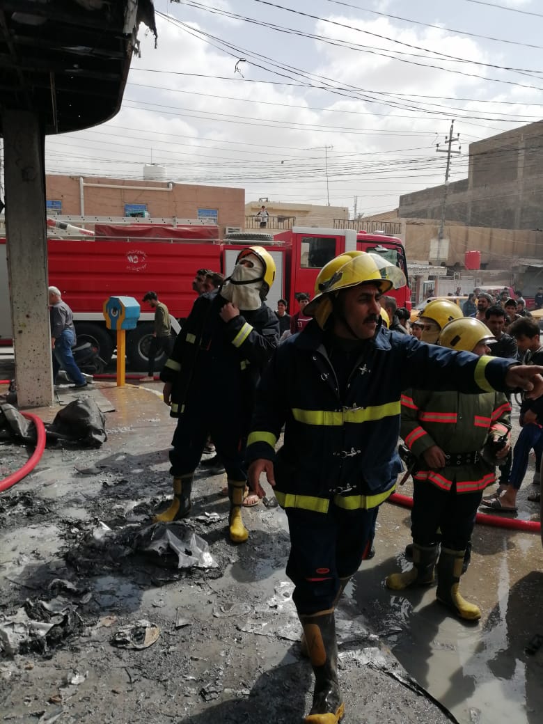 بالصور:اخماد حريق في احد احياء كربلاء