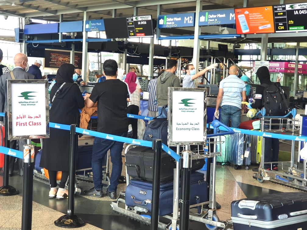 بالصور.. عودة العراقيين المتواجدين في ماليزيا