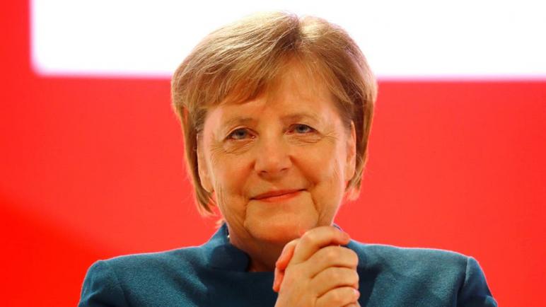 ميركل :لقاحات كورونا ستوزع في جميع أنحاء العالم