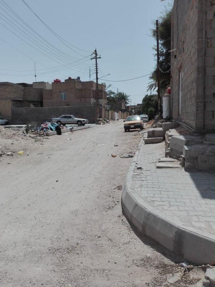 صور:شارع طوله 100 متر يتسبب بمعاناة ساكنيه بكربلاء