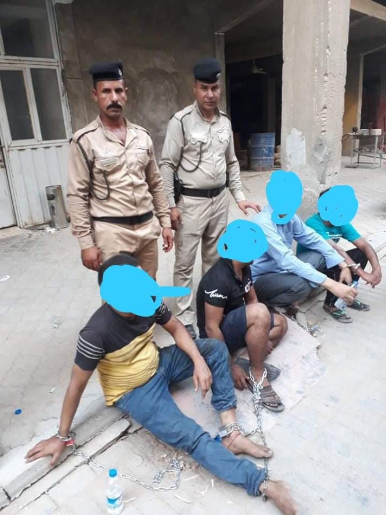 بالصور:شرطة كربلاء تلقي القبض على بنغاليين قاموا بتعذيب شخص آخر وتصويره
