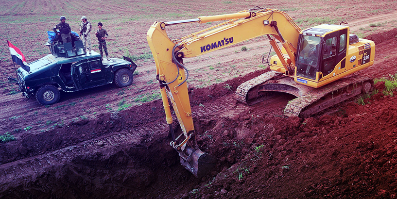 العراق يباشر بحفر خندق على الحدود مع سوريا