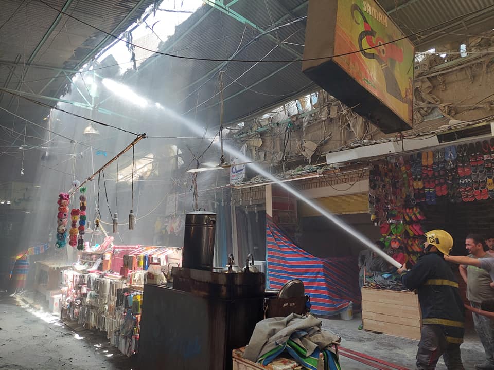 بالصور:حريق وسط سوق العلاوي بالمدينة القديمة في كربلاء