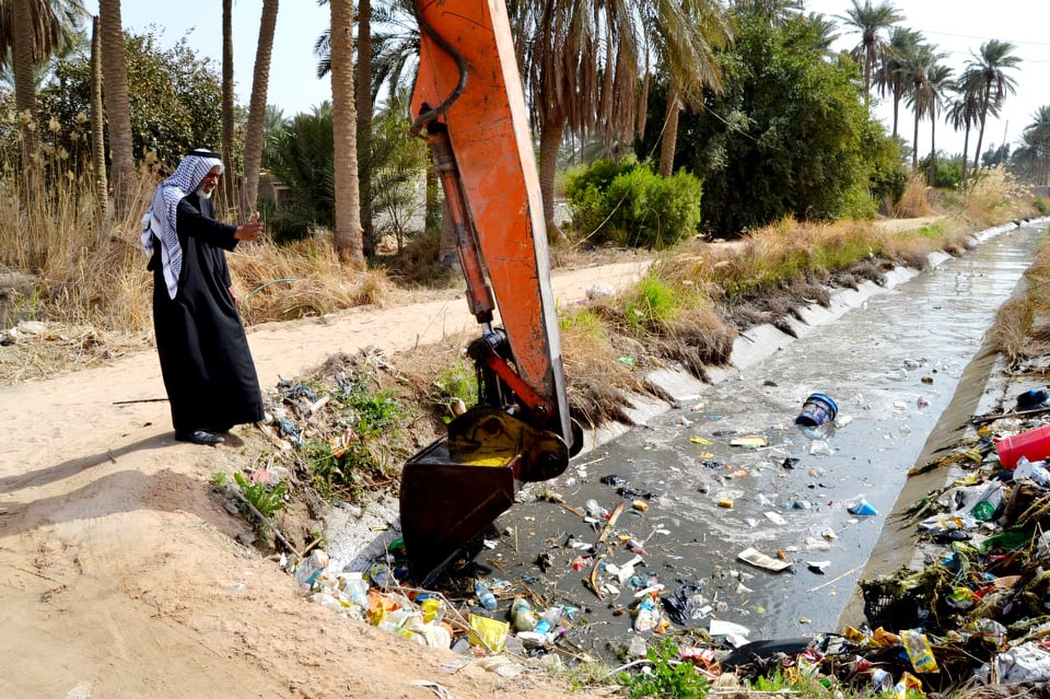 بالصور:تطهير نهر أبو زرع من الترسبات الطينية في كربلاء