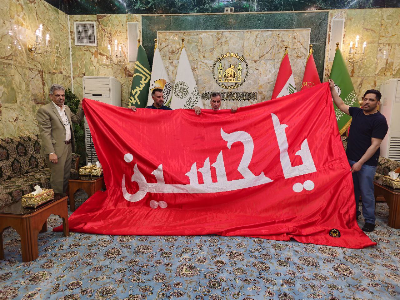 خدام الامام الحسين في ولاية ميشغان الامريكية يطالبون براية الحسين ..والعتبة الحسينية تستجيب