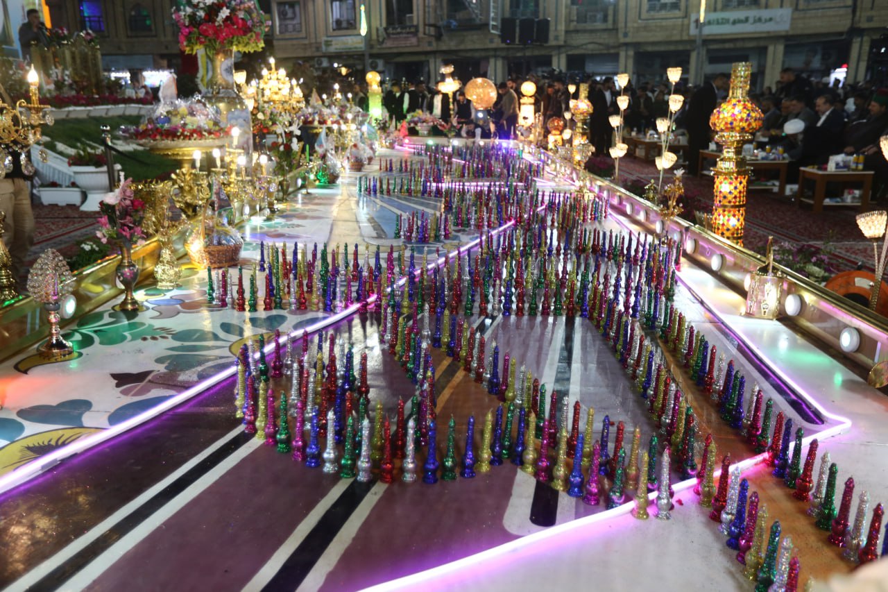 تقرير مصور:شموع الولادات المحمدية تنير منطقة بين الحرمين وسط كربلاء