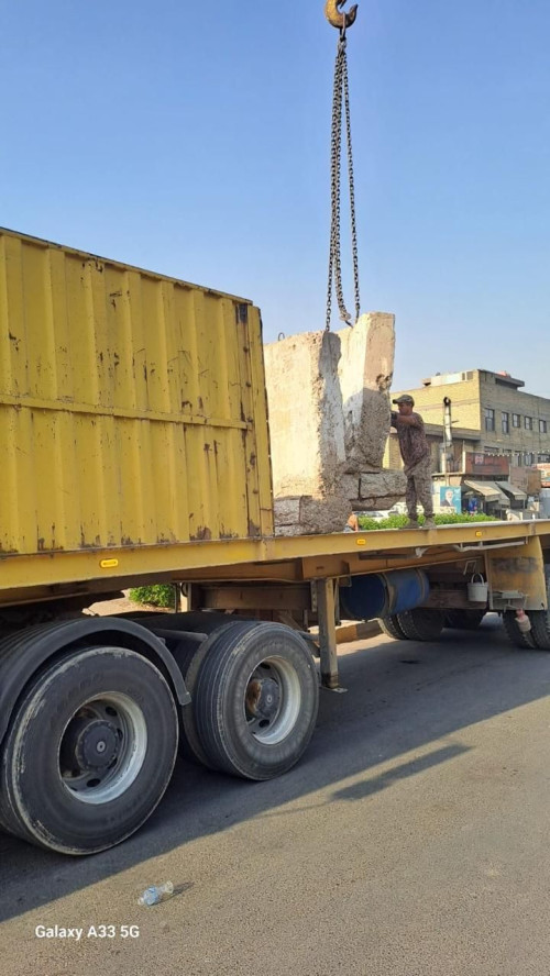رفع الكتل الكونكريتية وفتح طريق مغلق في منطقة "الكرادة