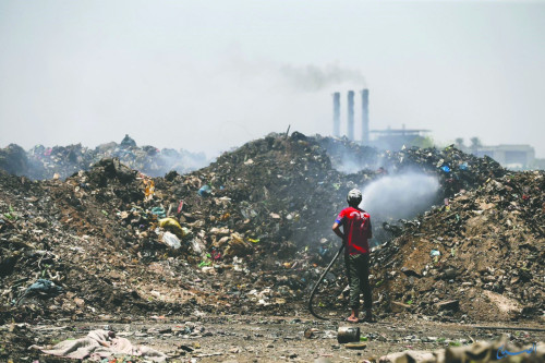 دخان حرق النفايات يخنق الأحياء الغربية لكربلاء