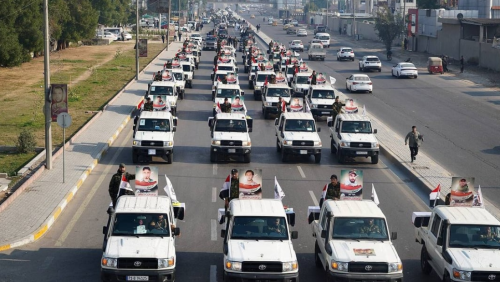 صور: الحشد يستذكر قصف معسكراته في القائم بتشييع رمزي وسط بغداد