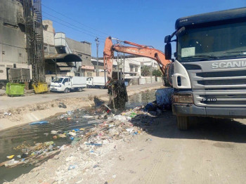 تطهير جدول الهندية لتأمين انسيابية الجريان المائي خلال زيارتي عاشوراء والأربعينية في كربلاء