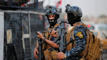الحكومة  تعلن القبض على المتورطين بالتجاوز على العلم الأمريكي في بغداد