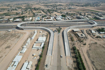 شاهد بالصور المراحل النهائية لمشروع تقاطع مجسر المطار في كربلاء